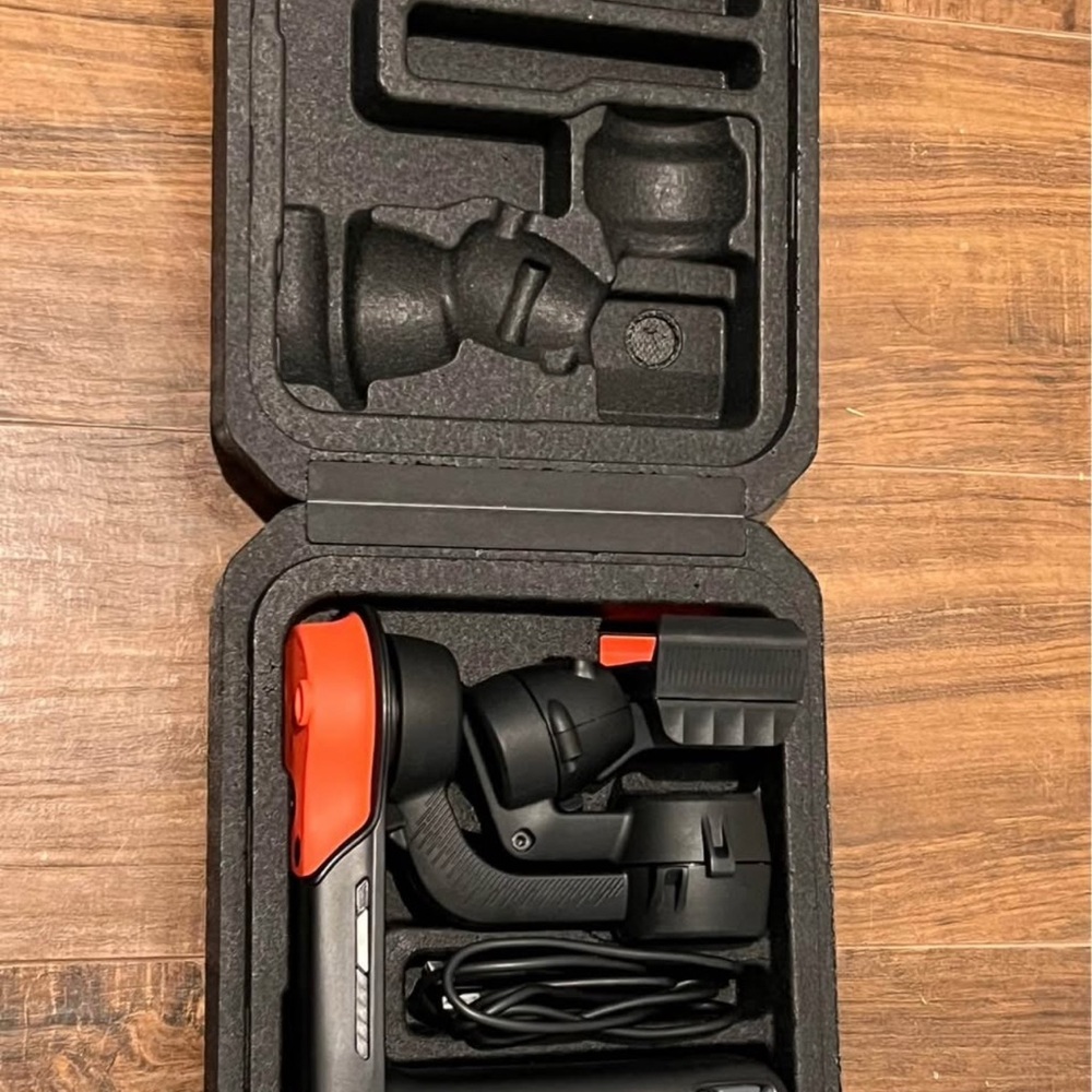 Black and Red Camera Stabilizer